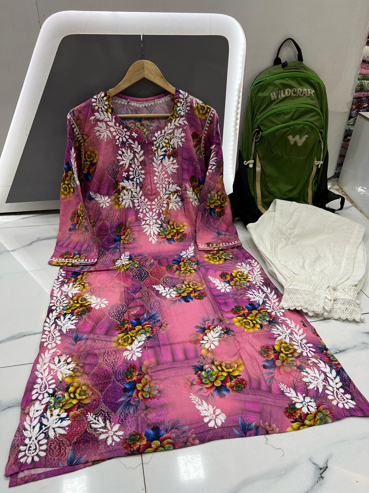 Blush Reverie – Faint Pink Printed Modal Kurta with Blue, Yellow & White Florals and Elegant White Chikankari Embroidery