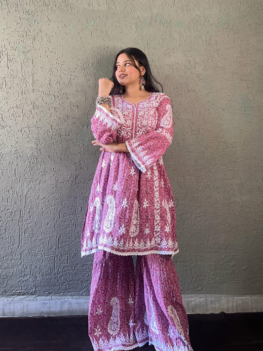 Heritage in Bloom – Dusky Rose Printed Mulmul Gharara Set Embellished with Rich Lucknowi Chikankari and Subtle Lace Trims on Bell Sleeves